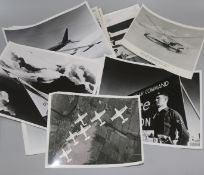 A leather photo album and loose photos