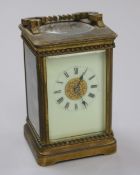 A late 19th century French brass cased eight day carriage timepiece