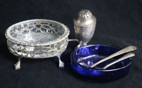 A Georgian silver salt(a.f.), two glass liners, a pepper and two condiment spoons.