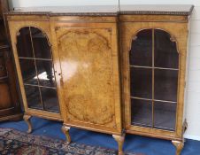 A 1930's walnut breakfront cabinet, W.150cm