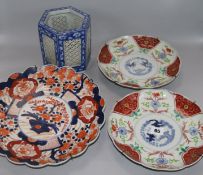 A pair of 19th century Imari saucer shaped dishes, one other larger and a Chinese blue and white