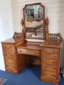 A Victorian mahogany kneehole dressing table, W.142cm