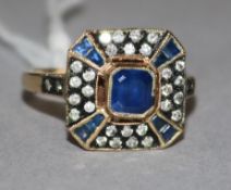 A 9ct gold, sapphire and diamond cluster tablet ring, size N.