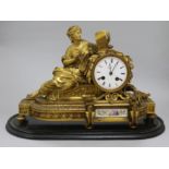 A French gilt bronze and porcelain mounted mantel clock