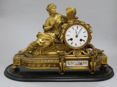 A French gilt bronze and porcelain mounted mantel clock