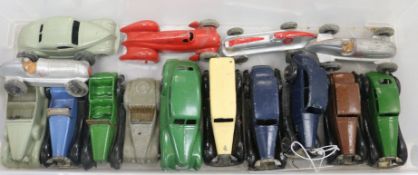 Four Dinky racing cars