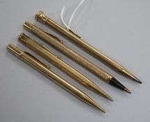 Four assorted 1930's/1940's 9ct gold overlaid pencils.