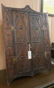 A Folk Art corner cupboard, H.65cm