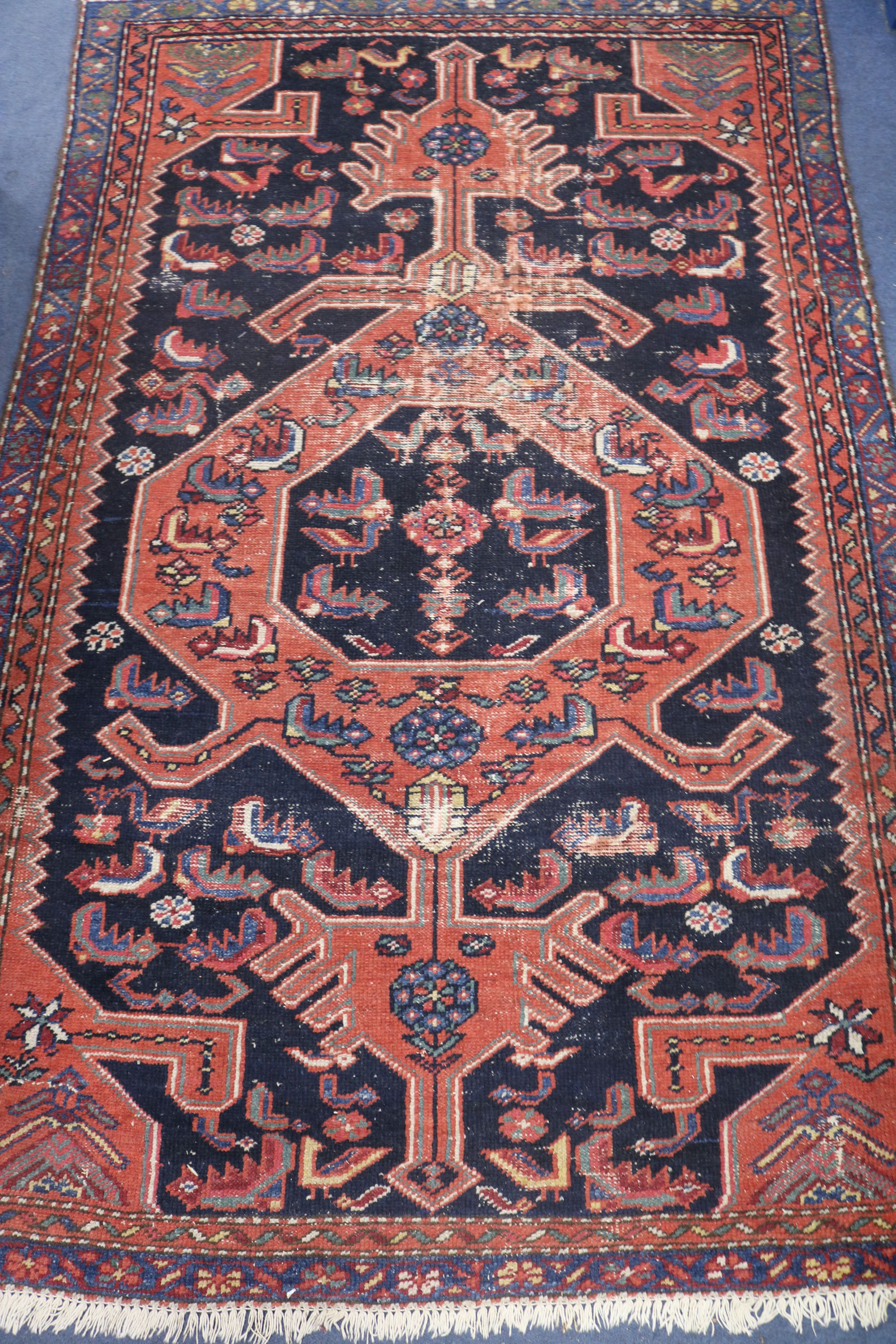 A rug, 170cm by 113cm