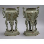 A pair of cast iron 'chinoiserie' vases