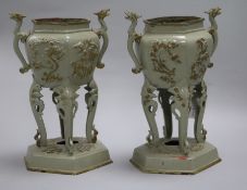 A pair of cast iron 'chinoiserie' vases