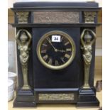 A black slate and gilt metal mantel clock