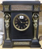 A black slate and gilt metal mantel clock