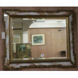 A wall mirror, W.80cm