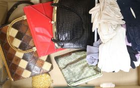 A collection of handbags and gloves