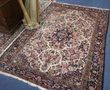 A pink and blue ground rug, 85 x 60in. 216cm x 148cm