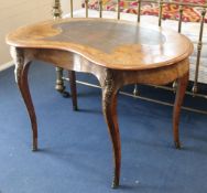 A Victorian walnut and kingwood banded kidney shaped bureau plat, W.122cm