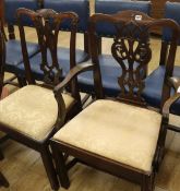 A single George III mahogany dining chair and a George III mahogany carver