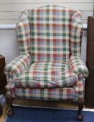 A check fabric wingback armchair