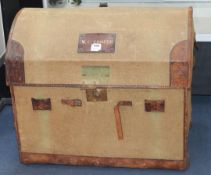 A leather bound canvas domed topped trunk, W.77cm