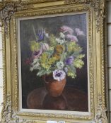 Laura A Happerfield (20th century), oil on canvas, still life of mixed flowers in a terracotta vase,