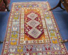 Three various Oriental rugs (worn), 215cm by 125cm, 185cm x 130cm & 150cm x 90cm