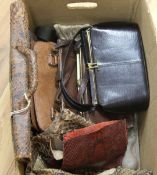 A collection of lizard and snake skin handbags, etc.