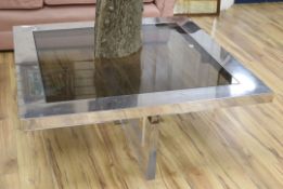 A stainless steel and Perspex coffee table, W.120cm