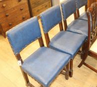 Four leather studded dining chairs