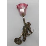 A cherub hanging lamp with cranberry shade