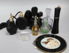 A collection of modern eau de parfum bottles, scent bottles and atomisers, some in Art Deco style,