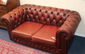 A buttoned leather Chesterfield, W.160cm