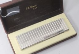 A cased Dupont white metal table lighter