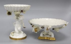 A Moore Bros white-glazed comport with cherub support and a tazza, each with applied decoration of