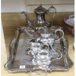 A silver plated two handled tea tray, a plated tea and coffee pot and a plated sugar bowl and