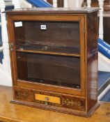 A small mahogany and brass inlaid wall cabinet, H.57cm