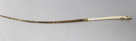 A gold mounted ivory 'horse hoof' riding crop