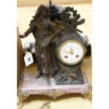 A French spelter and marble mantel clock and another black marble clock