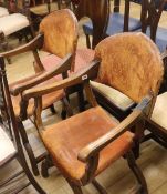 A pair of leather and oak x frame chairs