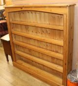 A pine open bookcase, W.140cm