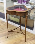 An Edwardian inlaid mahogany bijouterie table