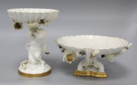 A Moore Bros white-glazed comport with cherub support and a tazza, each with applied decoration of