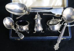 A 1960's Georg Jensen silver Acanthus pattern spoon, a cased silver condiment set, a George IV