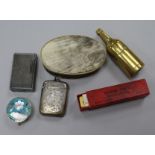 A collection of curios including novelty brass inkwell, Dupong lighter, snuff box, etc.