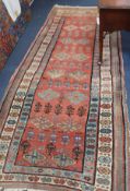 A Karabagh salmon pink ground runner, 255cm x 120cm