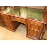 An Edwardian walnut desk, W.136cm