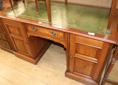 An Edwardian walnut desk, W.136cm