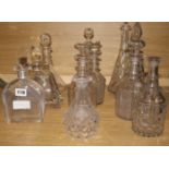 A collection of cut glass decanters