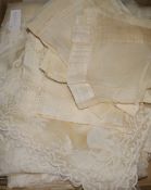 A cream silk gauze table cloth and napkins