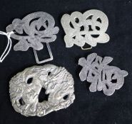 An early 20th century Chinese Export silver buckle by Tuck Chang & Co and two other Chinese buckle